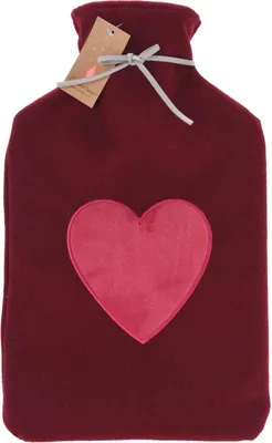 A burgundy hot water bottle with a pink heart applique, a tag attached to the neck, and a grey ribbon tie.