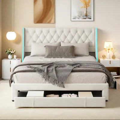 A bedroom scene featuring a tufted upholstered bed with LED lighting and storage drawers.