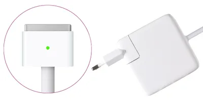 A close-up of a white Apple MacBook charger and its MagSafe connector.