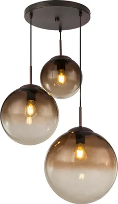 A close-up studio shot of a pendant light fixture with three glass globes.