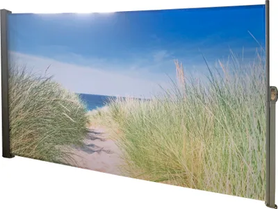 A retractable side awning with a scenic beach landscape print.