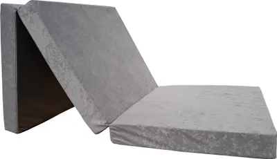 A folded gray mattress on a white background.