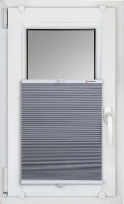 A close-up view of a gray pleated blind installed in a white window frame.
