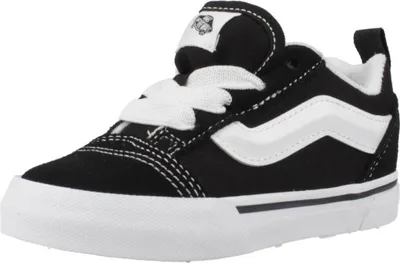 A studio shot of a single black and white Vans Knu Skool sneaker for children.