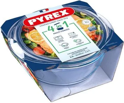 A Pyrex glass baking dish with a lid, presented in its retail packaging.