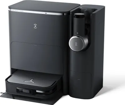 A studio shot of a black robot vacuum cleaner and its docking station.