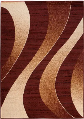 A close-up view of a rug with a modern abstract design.
