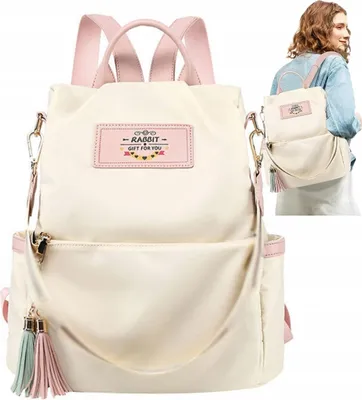 Immagine prodotto di Zaino urbano da donna spazioso con pompon, beige, sintetico impermeabile, 32x31x15 cm