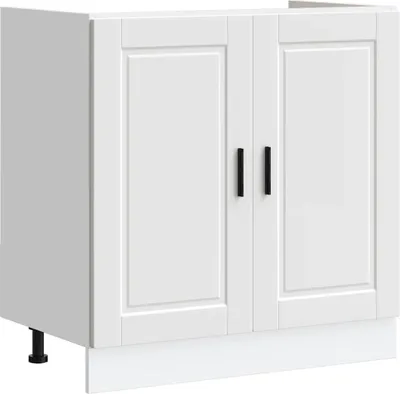 A white kitchen base cabinet with two doors and black handles, shown from a front-side angle.