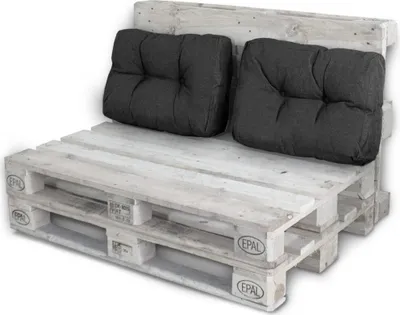 A pallet sofa with two dark gray cushions against a white background.