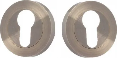 Two identical keyhole escutcheons are shown against a white background.