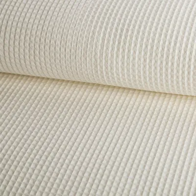 Produktbild von Bekleidungsstoff Meterware Waffelpique Baumwolle uni creme 150cm