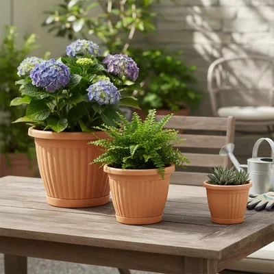 Obrázok produktu pre Sada 3 kvetináčov s podložkami – Kemer Kvetináč v 3 veľkostiach – udržateľný a elegantný – terakotová farba