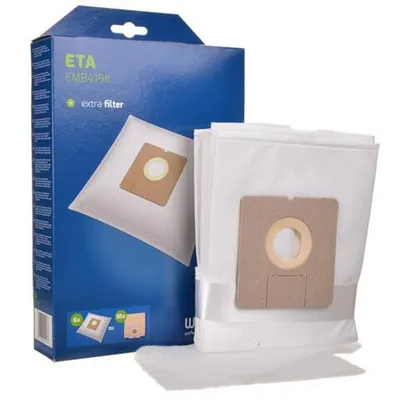 A product box and several vacuum cleaner bags.