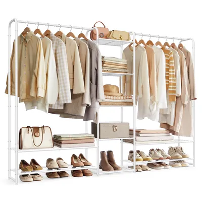 A white metal garment rack filled with clothing, bags, shoes, and folded linens.
