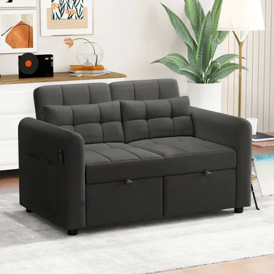 A dark gray sofa bed in a living room setting.