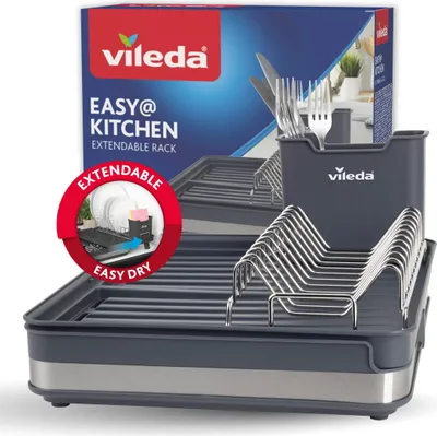 A Vileda dish drying rack is shown on a white background, with packaging visible behind it.