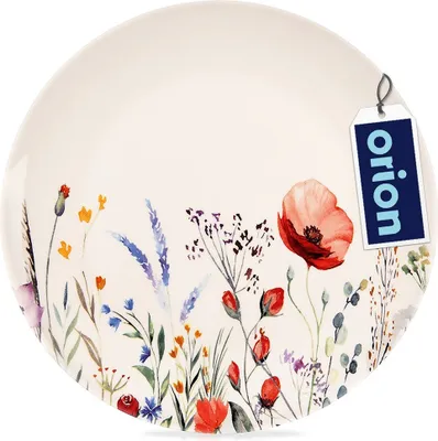 A close-up view of a round plate with a floral pattern.