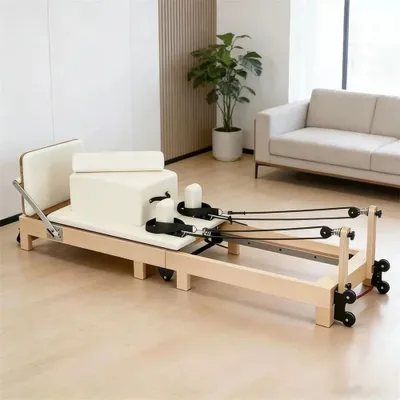Immagine prodotto di Pilates Reformer - Attrezzo da allenamento pieghevole - Resistenza regolabile - Carico massimo 250 kg -  e legno - Bianco
