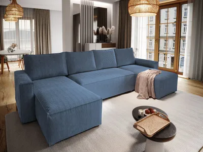 A modern living room with a large blue sectional sofa.