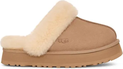 A single Ugg slipper on a white background.
