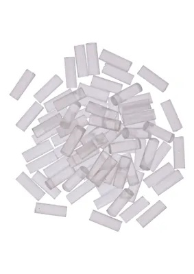 A pile of transparent glue sticks on a white background.