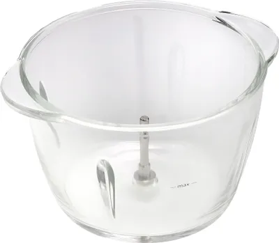 A clear glass bowl with a metal spindle in the center, likely a part of a food processor or blender.