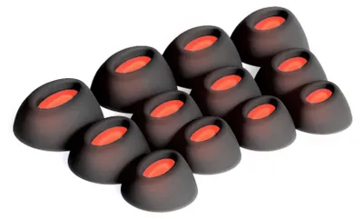 A collection of black silicone ear tips with red inner lining, arranged in a staggered pattern on a white background.