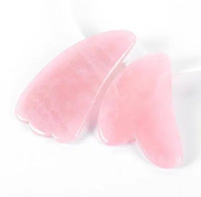 Produktbild von Gua Sha Massage-Set aus Rosenquarz für Gesicht und Körper