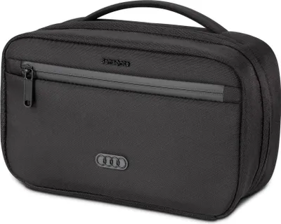 A black toiletry bag with a handle and a zippered compartment.
