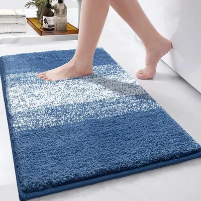 Produktbild von Unyqoos® Badematte – superweiche Hochflor-Mikrofaser, 50 x 80 cm, 15 mm Flor, saugstark, rutschfeste TPR-Unterseite, maschinenwaschbar