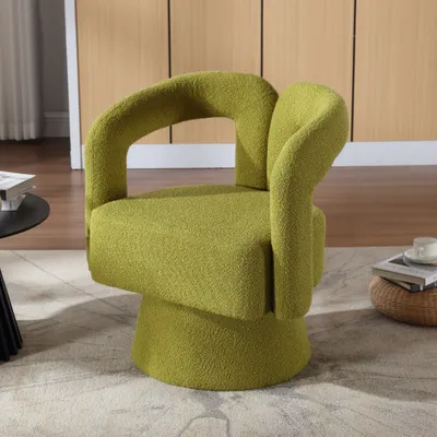A green swivel armchair is shown in a room with wooden walls and a patterned rug.