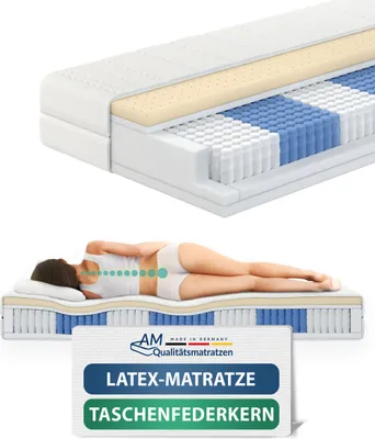 A cutaway view of a mattress and a person sleeping on a mattress.