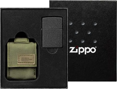 A Zippo lighter gift set in its packaging, featuring a black lighter and a green pouch.