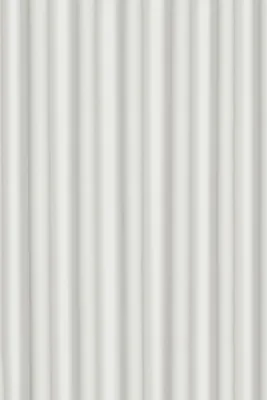 A close-up view of a white, vertically pleated fabric.