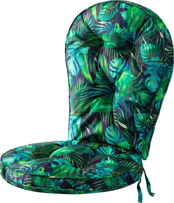 A close-up studio shot of a chair cushion with a tropical leaf pattern.