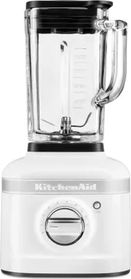 A white KitchenAid blender is shown against a white background.