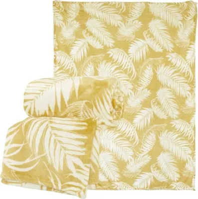 Three folded blankets with a palm leaf pattern.
