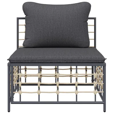 A studio shot of an outdoor sofa with dark gray cushions and a woven base.