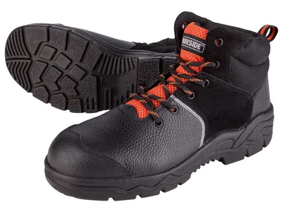 A pair of black and orange work boots shown from a slightly elevated angle against a white background.