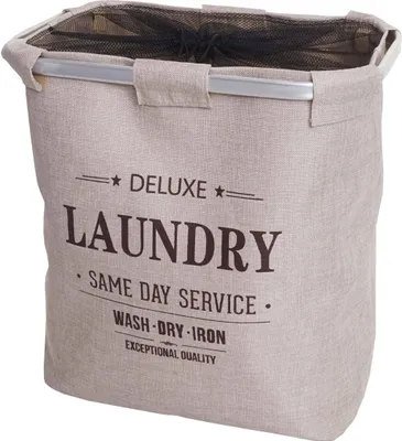 A beige laundry basket with text printed on it.