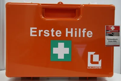 Produktbild von Verbandkasten + Wandhalter orange inklusive Verbandbuchr DIN13157 620111