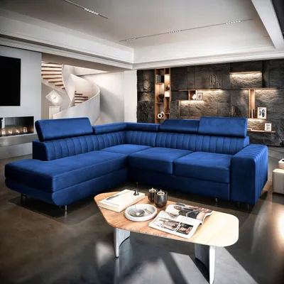 A modern living room with a blue sectional sofa.