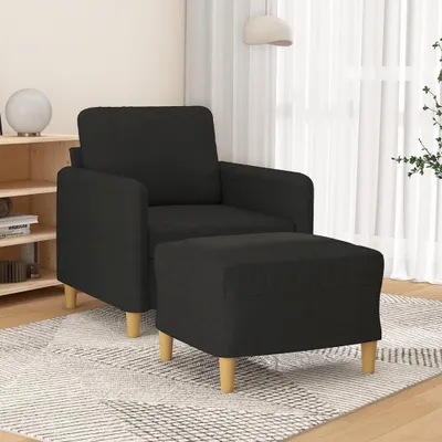 Immagine prodotto di Poltrona nera con poggiapiedi di 60 cm di altezza, rivestita in tessuto e con imbottitura confortevole, ideale per il soggiorno, il relax e la lettura