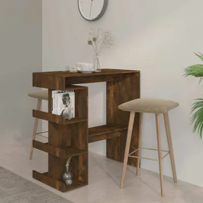 A bar table with a shelf and two bar stools in a room.