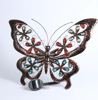 A decorative butterfly solar light.