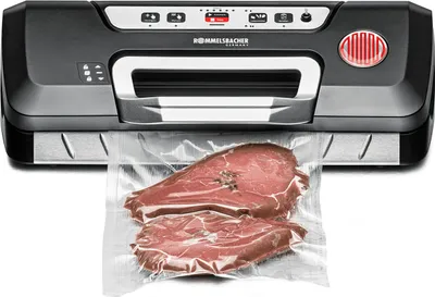 A vacuum sealer machine is shown with a bag of meat being sealed.