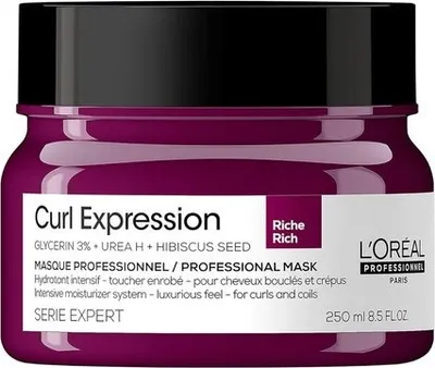 A jar of L'Oréal Curl Expression hair mask on a white background.