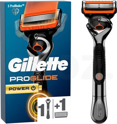 A product shot of a Gillette Fusion5 Proglide Power electric razor and its packaging.