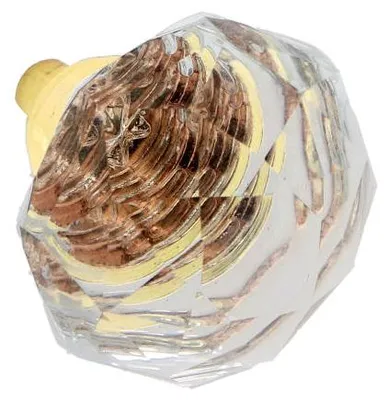 Imagen del producto de Pomo para muebles, fabricado en zamak y cristal, con un diámetro de 33 mm y acabado en dorado